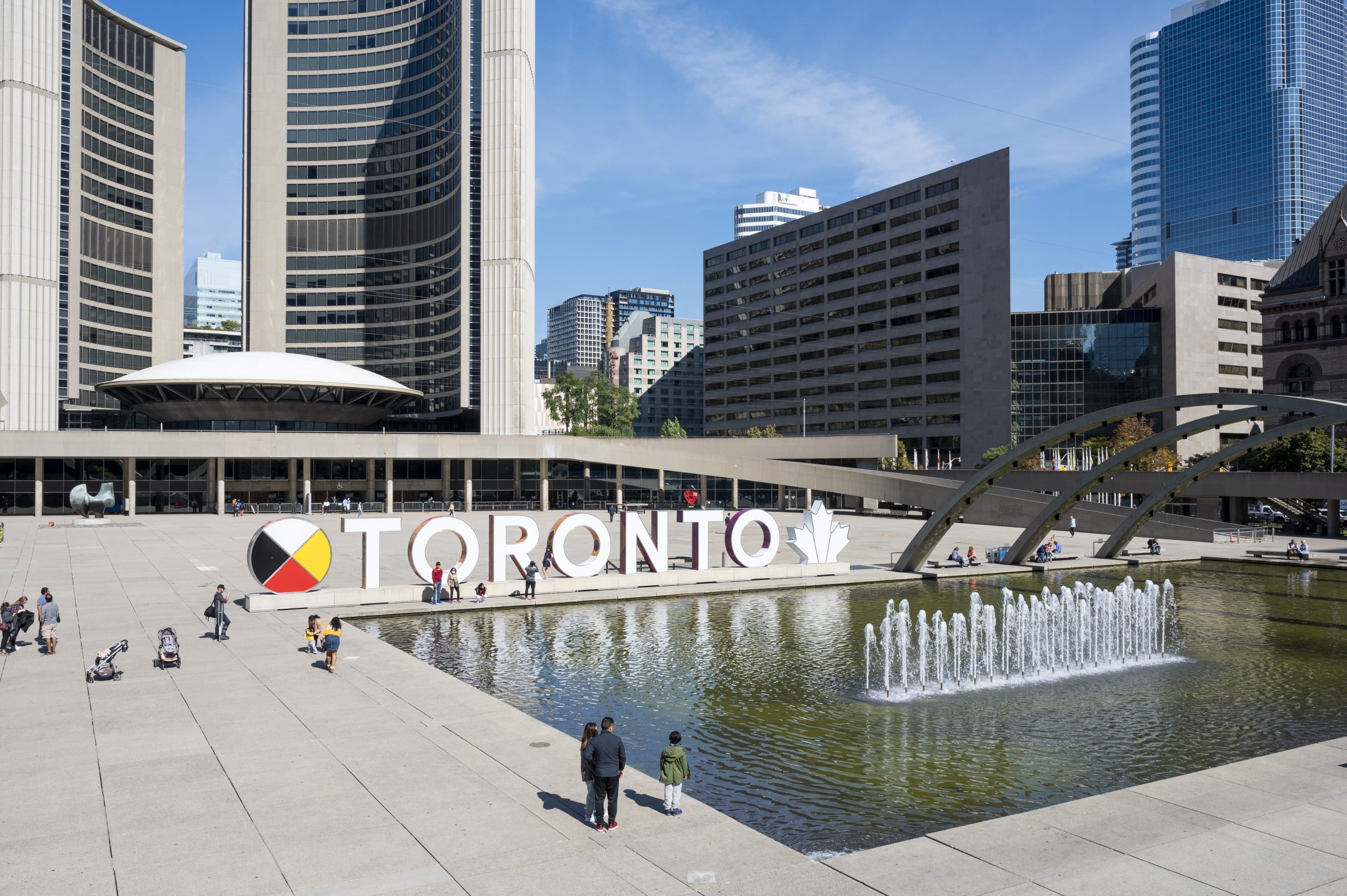 Toronto sign in front of Toronto City Hall